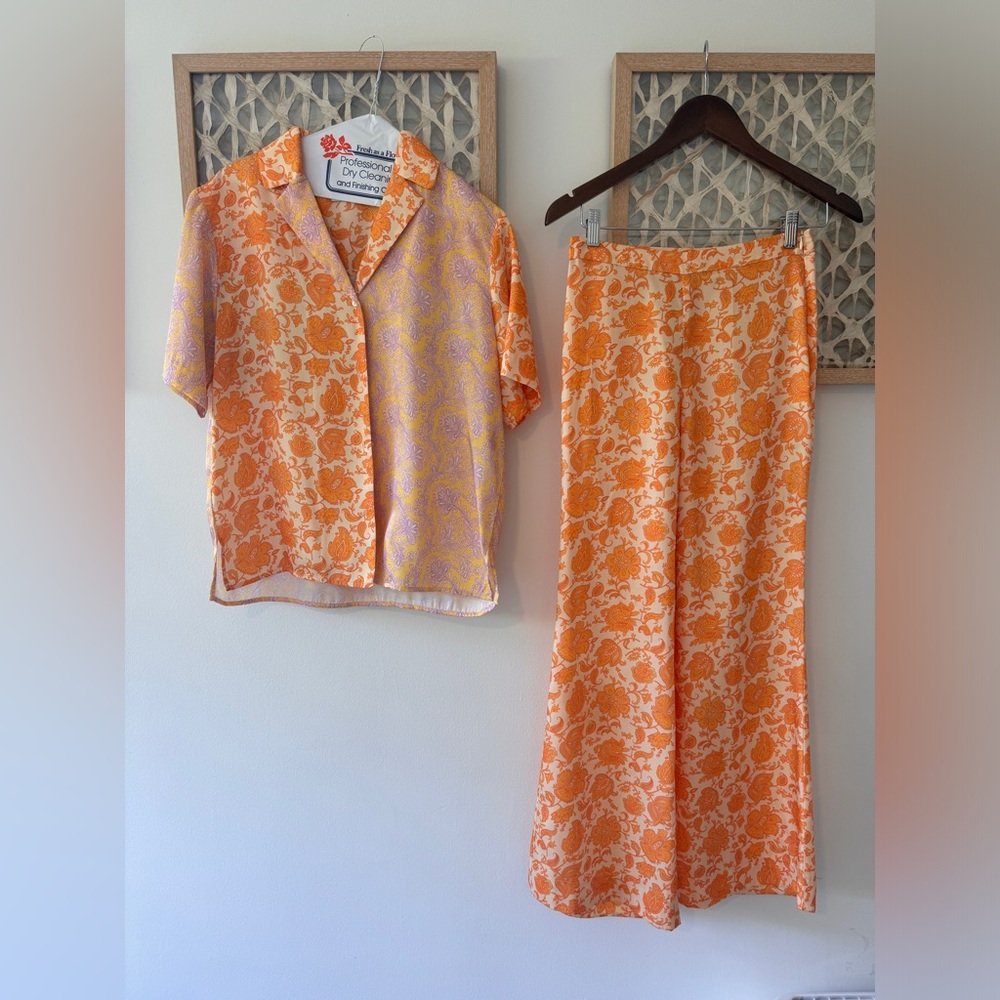 Sandro floral print set. Trousers are high rise and flared.
